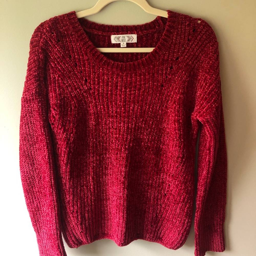 Red, cozy women’s sweater.